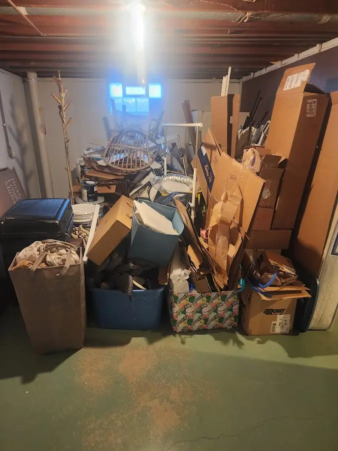 Roll-off dumpster container at job site for 6 Yard Dumpster Rental in Mandeville